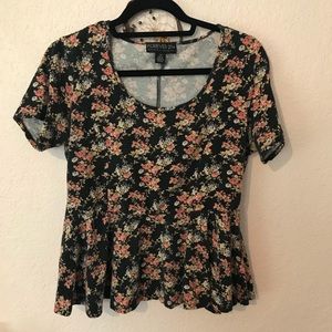 Plus size floral peplum top.